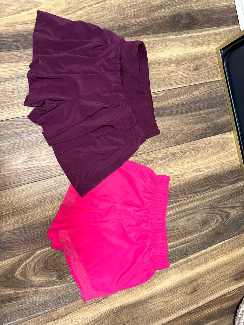 Pair of Women's Athletic Skorts in Plum and Hot Pink